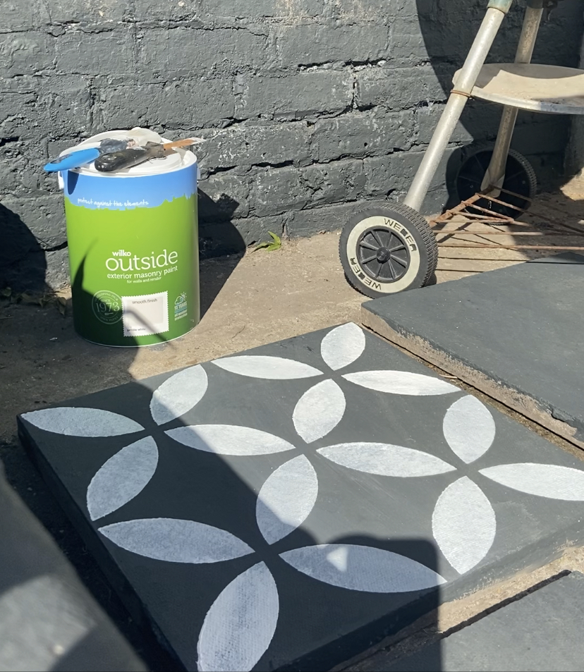 Stencilling patio slabs